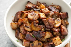 A finished plate of easy Chinese beef and mushroom stir fry.